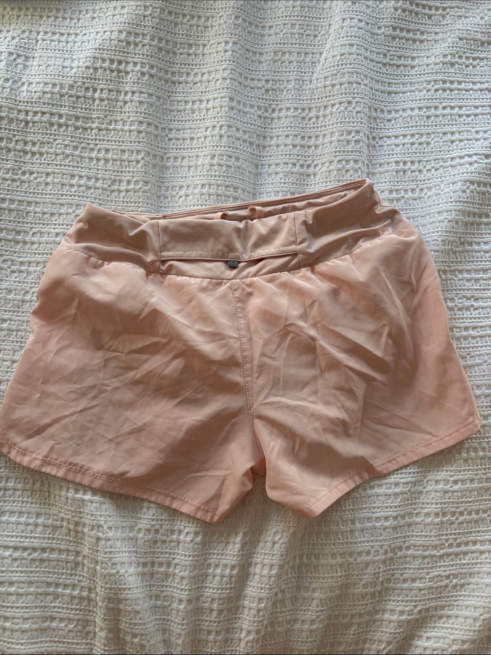 Nike Women's Light Pink Athletic Shorts with Reflective Swoosh - Picture 2 of 3